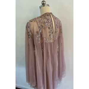 ASOS mini dress with heavily embellished cape